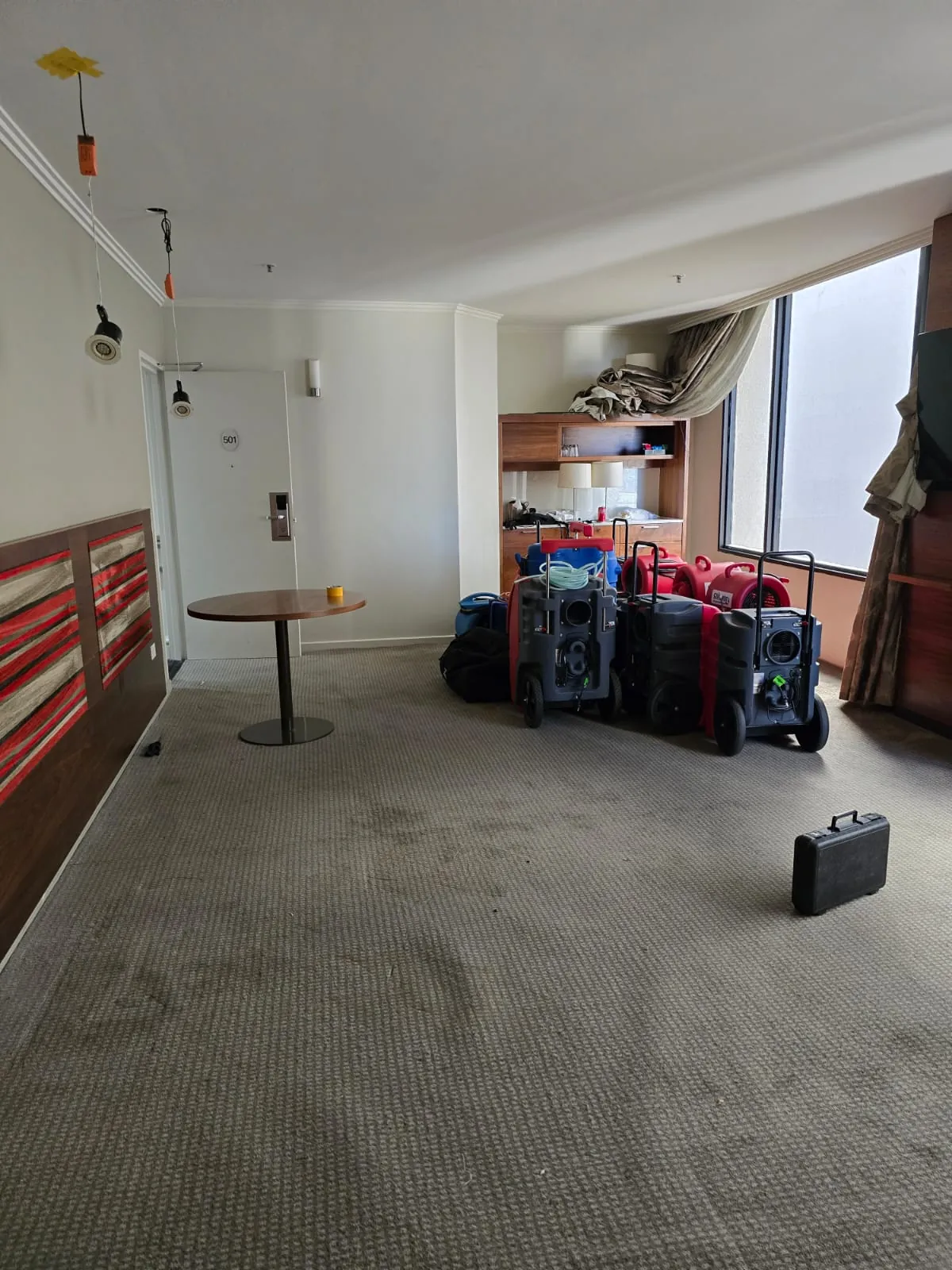 Contents moved clear so the room could be dried.