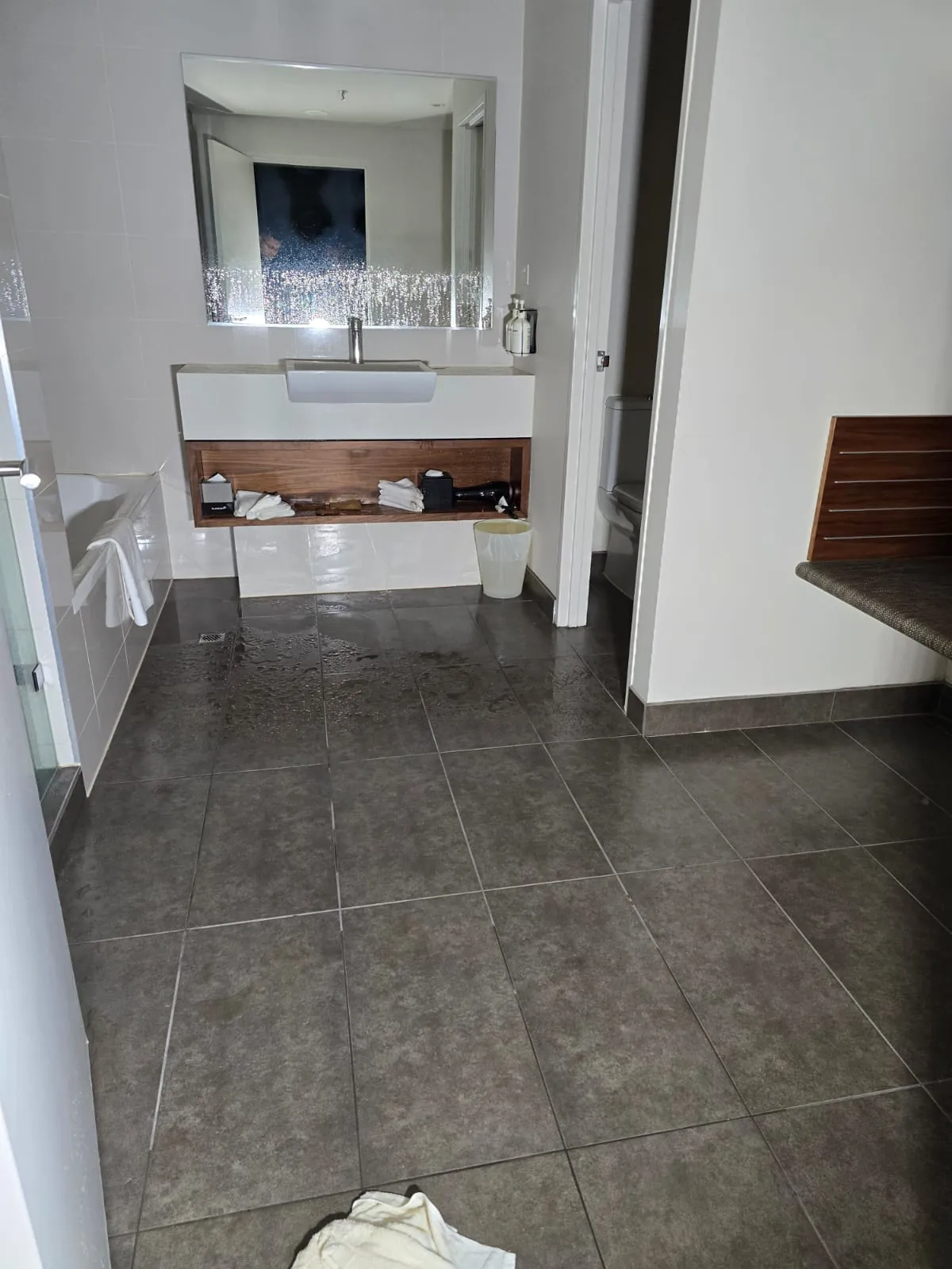 Towels on the tiled floor of an affected ensuite.